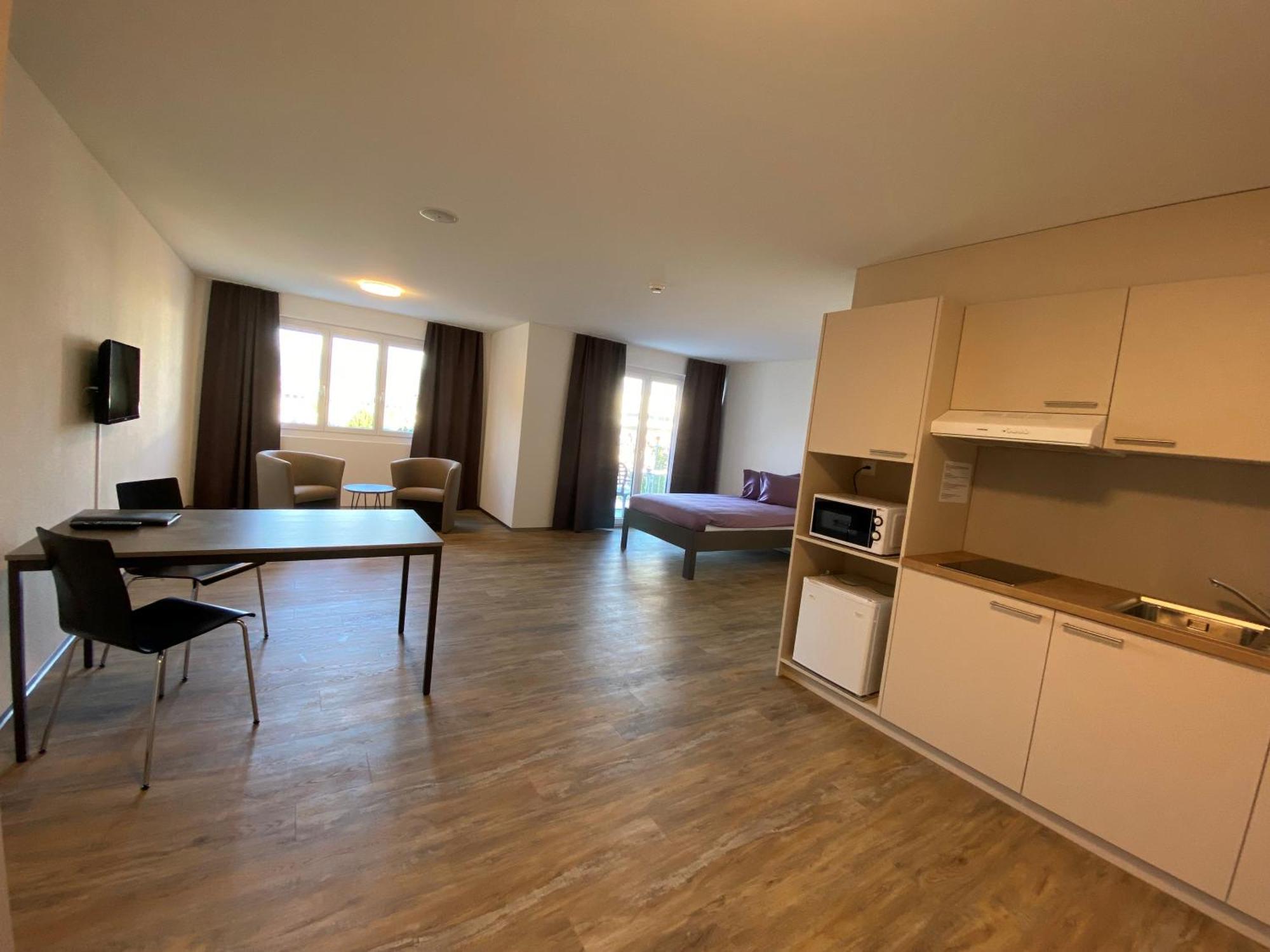 Motel & Aparthotel Brueggli Еммен Екстер'єр фото